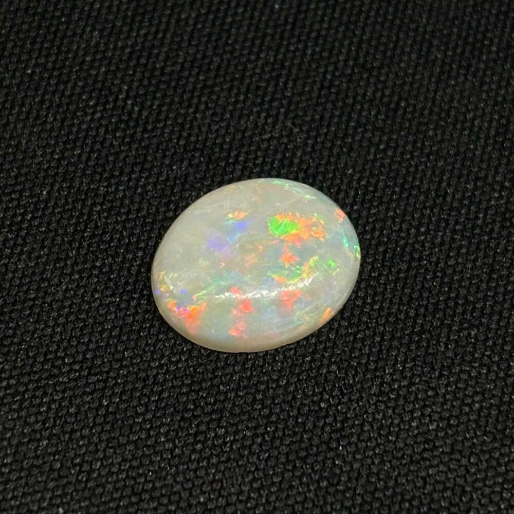Dark Medium Dome Mintabie Opal With Color Spectrum Pattern